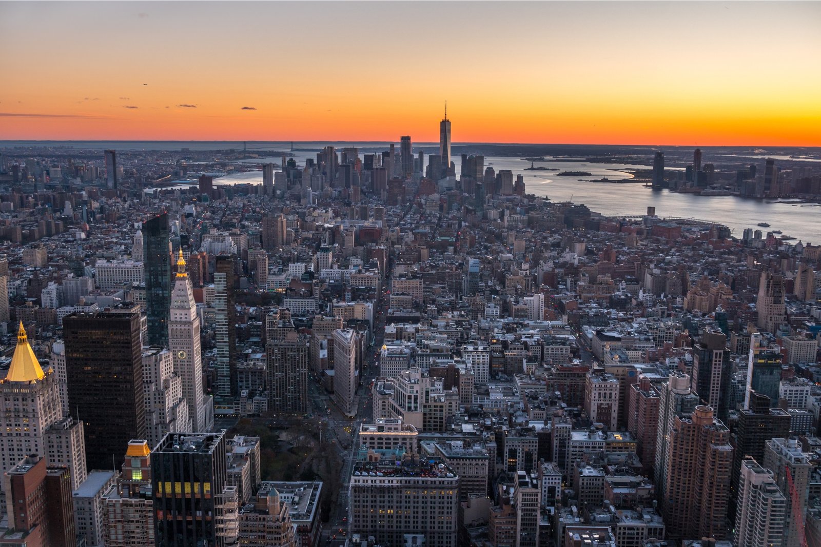Cityscape of Manhattan, New York at Sunset.